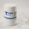White bottle labeled TCaRe Easyflow conductive cream with a clear pump cap lying beside it on a white surface.